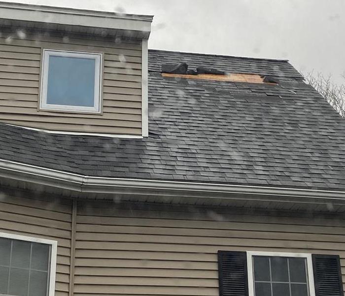 Wind damaged roof